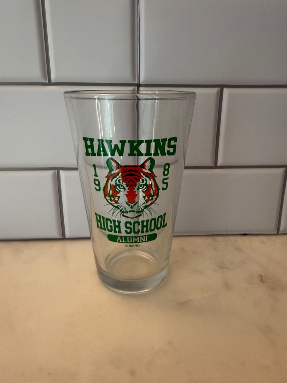 Hawkins High School Alumni Tiger Pint Glass - Green/Orange